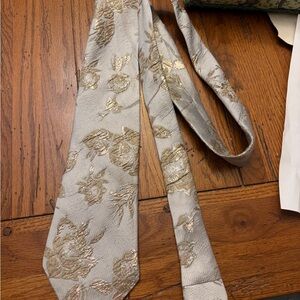 Montage by Mon Cheri blue mist and gold custom floral tie.